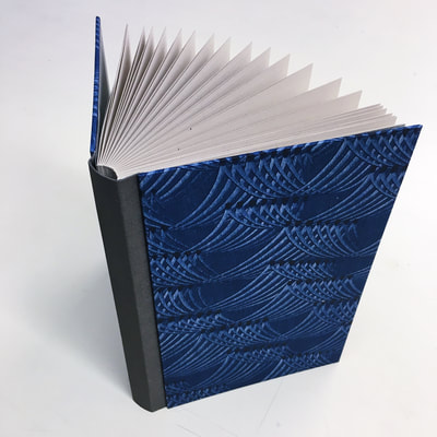 Bookmaking class: Make your own leather-bound sketchbook – Tear Cap  Workshops